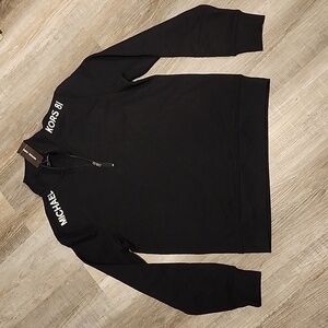 Michael Kors 3/4 zip pullover size medium black w/white michael kors on shoulder